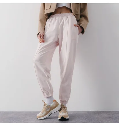 Штани жіночі New Balance Pant Jogger Athletic Pink WP23553WAN
