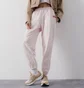 Штани жіночі New Balance Pant Jogger Athletic Pink WP23553WAN