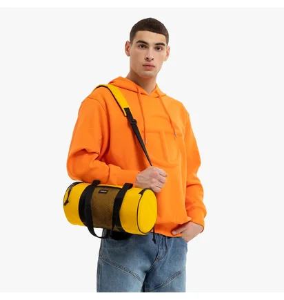 Сумка унисекс EASTPAK X Telfar Duffel Yellow EK0A5BFR2A6