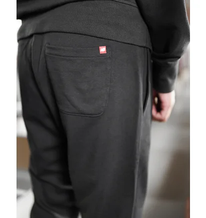 Штаны мужские New Balance Nb Ess Stacked Logo Black MP03558BK