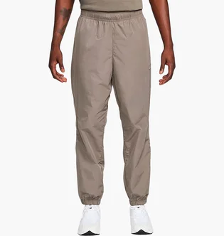 Штани чоловічі Nike Nocta Beige FN7668-040