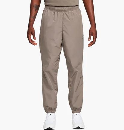 Штани чоловічі Nike Nocta Beige FN7668-040