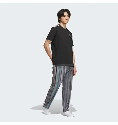 Штаны унисекс Adidas Song For The Mute Allover Print Trousers Grey IY9515