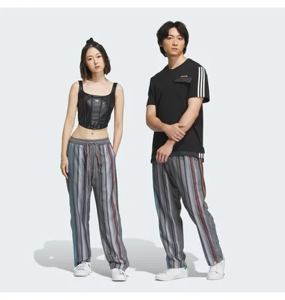 Штаны унисекс Adidas Song For The Mute Allover Print Trousers Grey IY9515