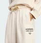 Штани жіночі Adidas Athl Dept Loose Graphic Sweat Beige KF2315