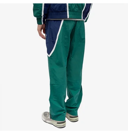 Штани чоловічі New Balance Hoops Woven Pant Turquoise MP33589TFN