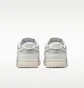 Кросівки жіночі Nike Dunk Low Next Nature White/Metallic IB7311-001
