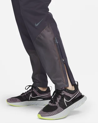 Штани жіночі Nike Womens Running Pants Violet DD6819-540