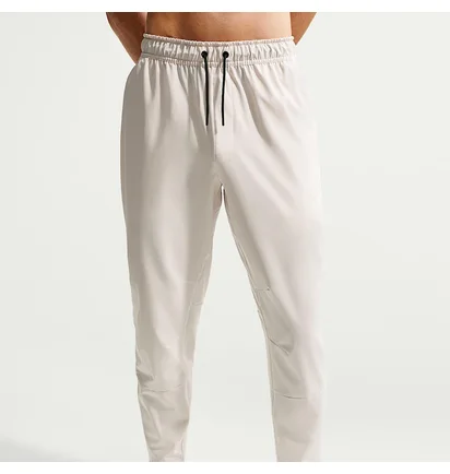 Штаны мужские Nike MenS Dri-Fit Zip Cuff Versatile Trousers Beige FB7548-104
