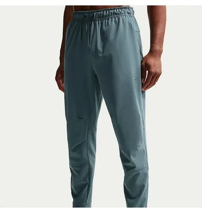 Штани чоловічі Nike Unlimited MenS Dri- F I T Zippered Cuff Versatile Pants Turquoise FB7548-382