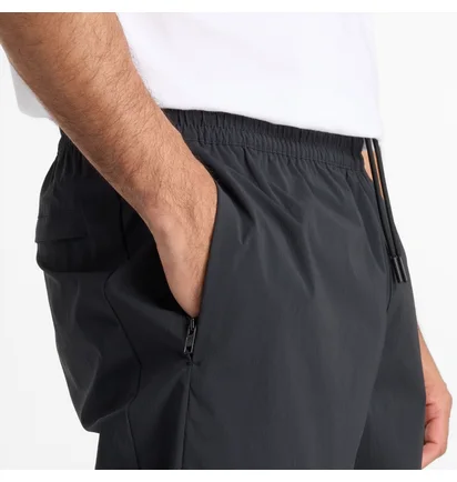 Штаны мужские New Balance Athletics Stretch Woven Jogger Black MP41510BK