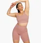 Топ женский Nike Go WomenS Firm-Support High-Waisted 8 Biker Shorts With Pockets Peach DQ5923-618