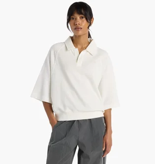 Поло жіноче New Balance Coastal Fleece Oversized Polo White WT611044SST