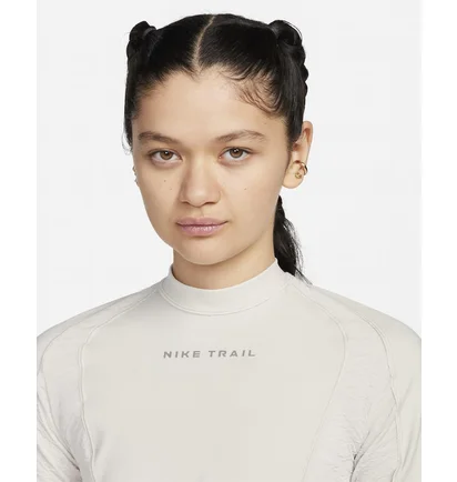 Лонгслів жіночий Nike Dri-Fit Trail Beige FN4706-104