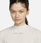 Лонгслів жіночий Nike Dri-Fit Trail Beige FN4706-104