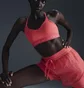 Топ женский Nike Indy Light Support Padded Adjustable Sports Bra Pink FD1062-629