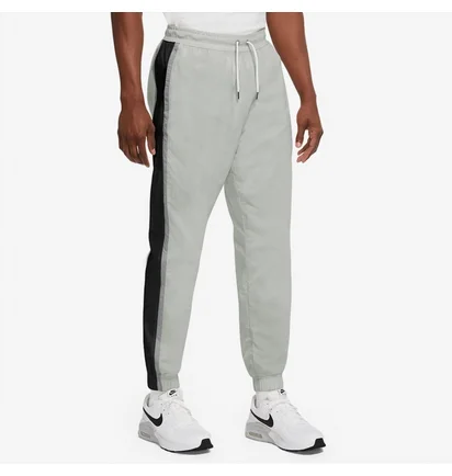 Штани чоловічі Nike Sportswear Woven Lined Pant Snl Cb Grey CZ9964-097
