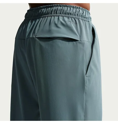 Штани чоловічі Nike Unlimited MenS Dri- F I T Zippered Cuff Versatile Pants Turquoise FB7548-382