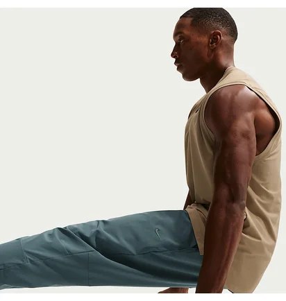 Штани чоловічі Nike Unlimited MenS Dri- F I T Zippered Cuff Versatile Pants Turquoise FB7548-382