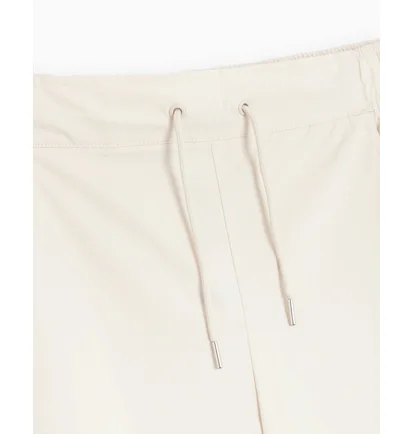 Штани жіночі Nike Sportswear Essentials Woven High Rise Oh Pants Beige FB8284-104