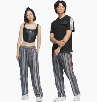 Штаны унисекс Adidas Song For The Mute Allover Print Trousers Grey IY9515