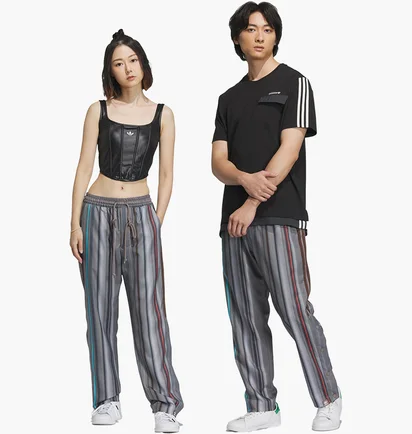 Штаны унисекс Adidas Song For The Mute Allover Print Trousers Grey IY9515