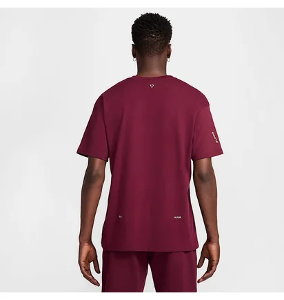 Футболка унісекс Nike Nocta Cs Short-Sleeve Tee Bordo HM5774-638
