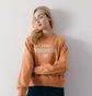 Світшот жіночий New Balance Sweat Crew Graphic Essential Orange WT31508SEI