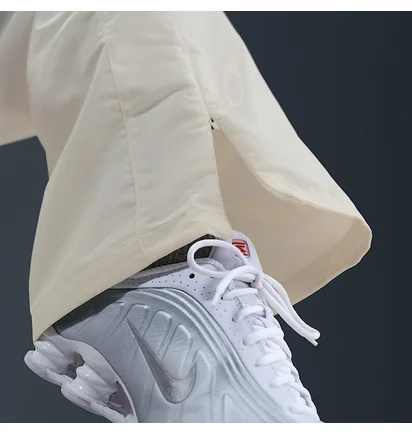 Штани жіночі Nike Liq Shine Beige HV2475-133