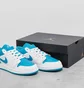 Кросівки дитячі Air Jordan Air 1 Low Junior White/Light Blue 553560-174