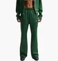 Штаны женские Nike Sportswear Windrunner Mid-Rise Slim Knit Green HJ1016-323
