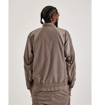 Олімпійка чоловіча Nike Nocta Woven Track Jacket Brown FN7666-040